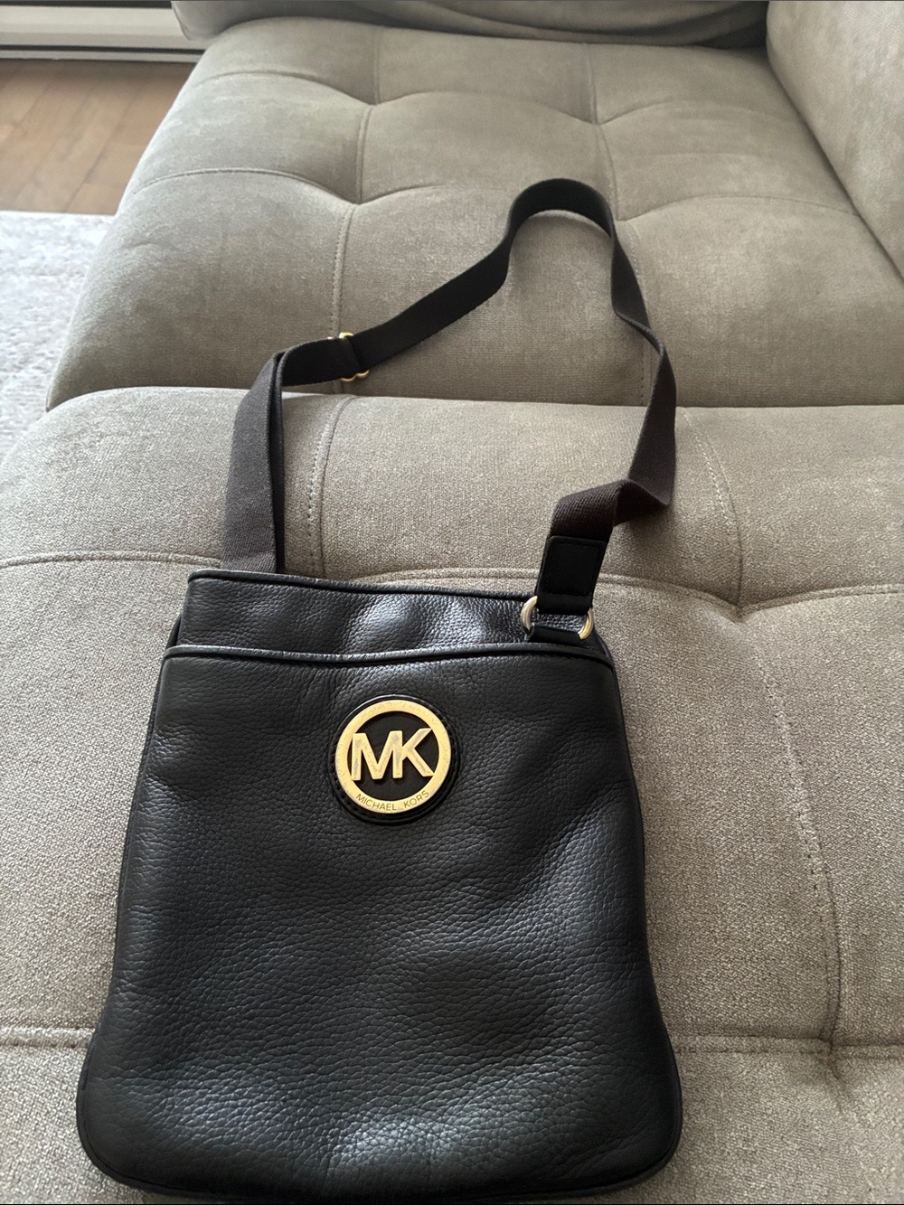Michael Kors Black Leather Messenger Bag with Gold MK Medallion